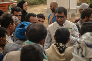 Oxfam GB CEO, Danny Sriskandarajah visiting Houth, IDP camp, Yemen. During the war, which escalated on 25 March 2015, communities were displaced from Sa`ada, and Hajah districts and fled to Houth district, Amran